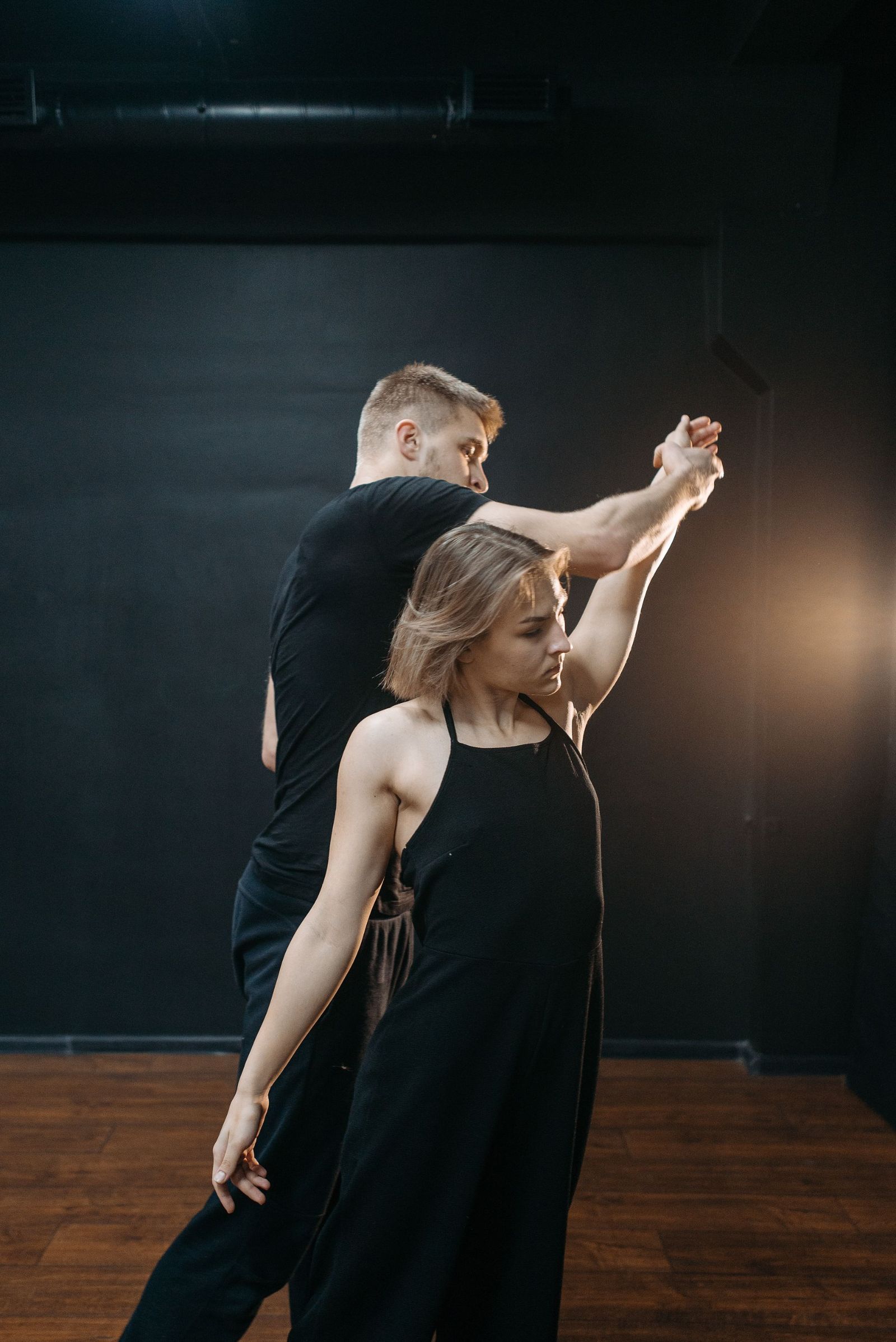 Couple choreographing their first dance routine in the studio